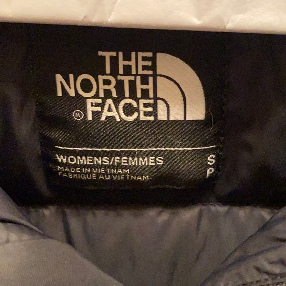 The North Face long puffer coat, black. Only worn a couple times